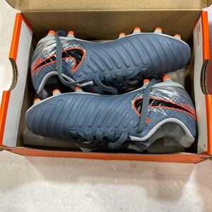 Nike soccer cleats. Never worn, new in box.